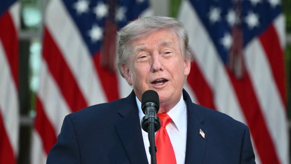 Trump says unfrozen Iranian assets will be used to buy American wheat, soy beans, corn